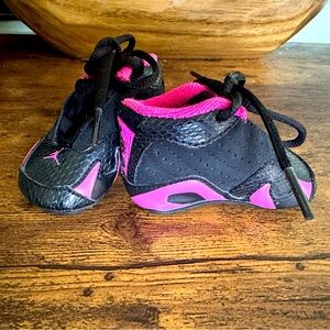Black and pink newborn baby girl, Jordan, tennis shoes.